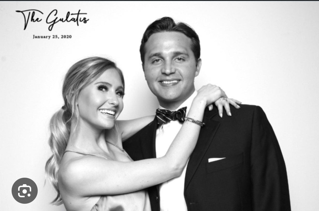Black and white Glam portrait of a couple in formal wedding attire